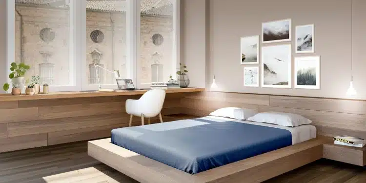 a bed room with a neatly made bed and a desk