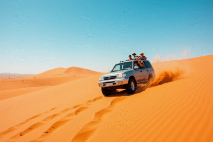 Véhicule 4x4 dans les dunes orange du Namib